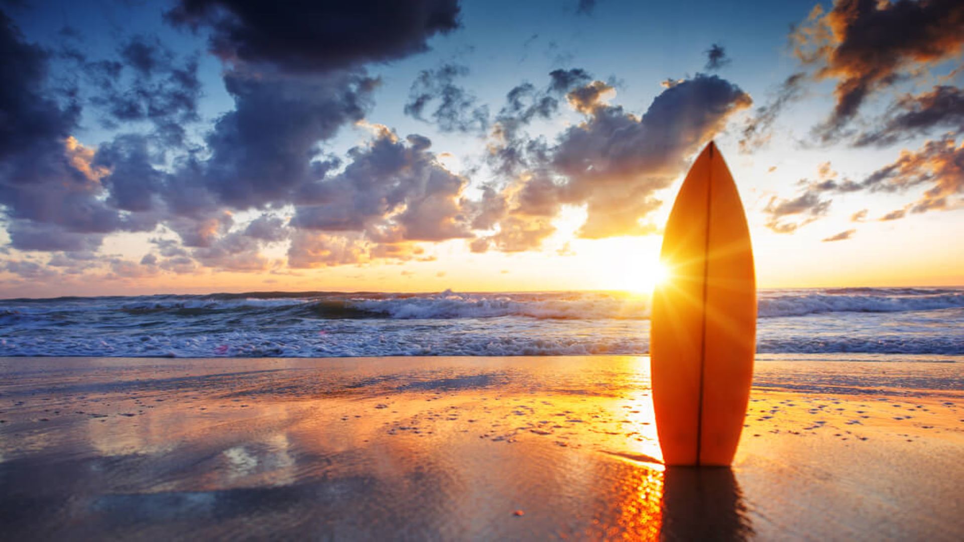 A surfboard on a beach in Kapalua