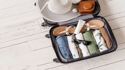 A suitcase with a packing list for a trip to Maui