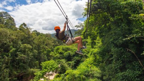 A woman ziplining in Kapalua, Maui