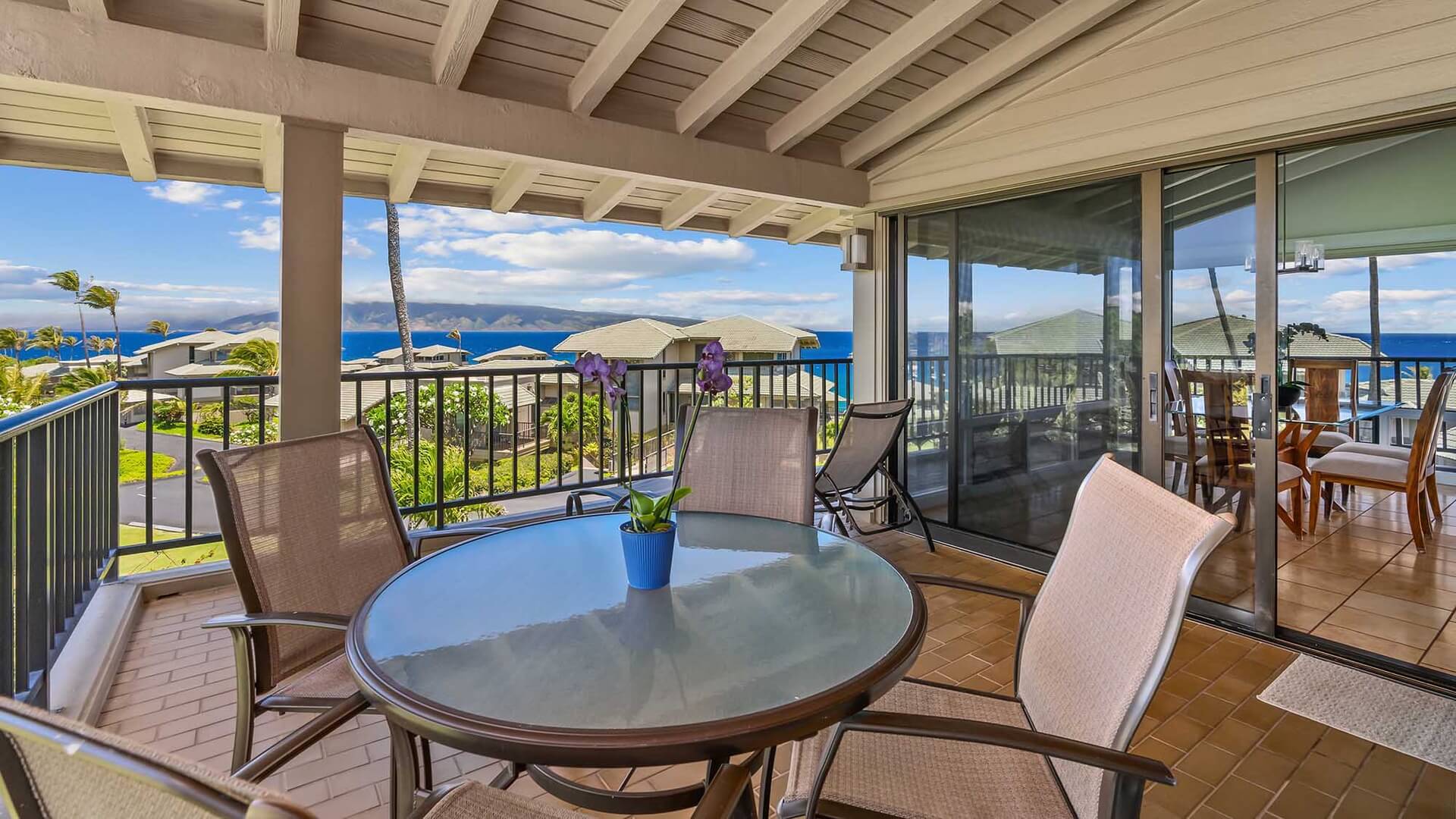 The spacious lanai with a dining room table at Kapalua Bay Villa 11B3