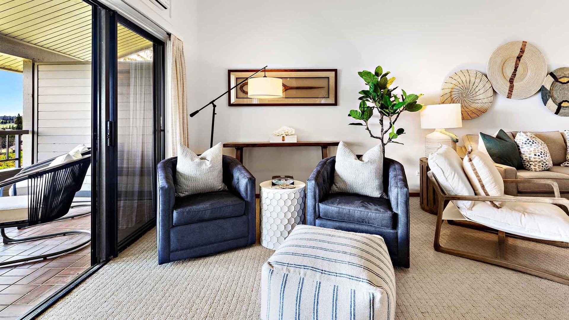 A comfortable seating area right next to the lanai at Kapalua Ridge Villa 1624