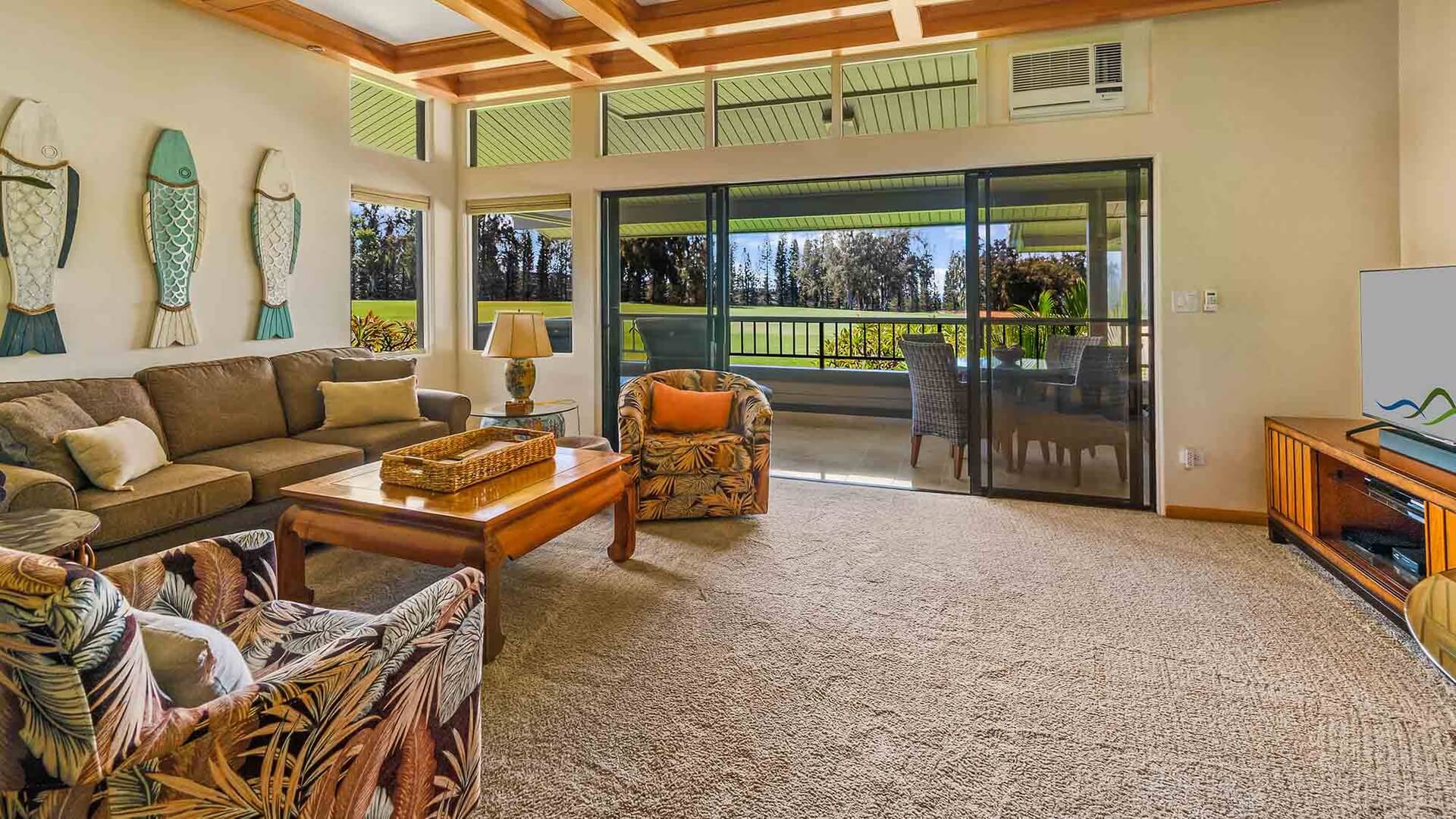 The living room and private lanai at Kapalua Ridge Villa 2322