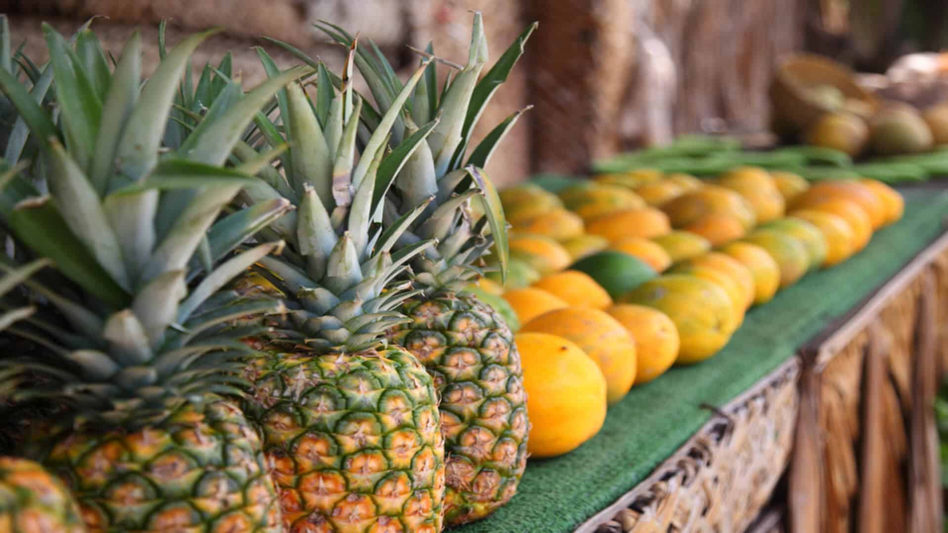 Pineapple and other fruit for sale at one of Maui's farmers markets
