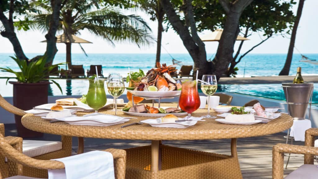 A romantic dinner with a table with ocean views in Maui