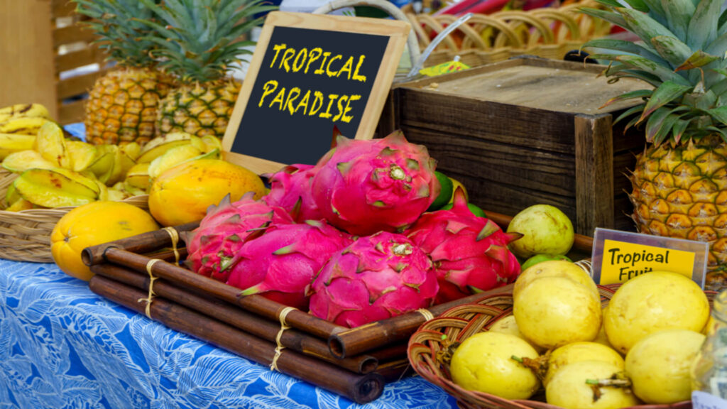 A tropical fruit stand set up at Maui Swap Meet